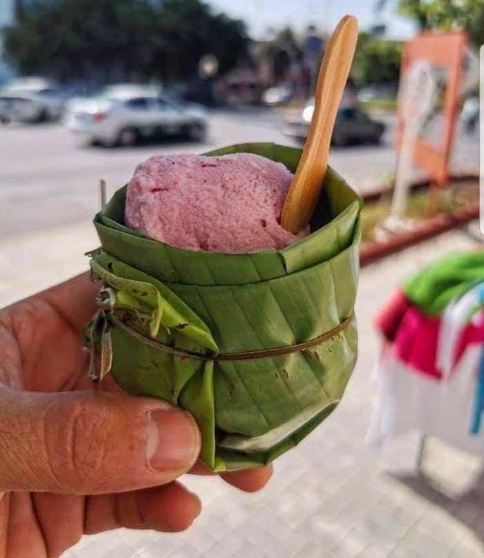 Ice Cream Served In A Cup Made Out Of A Banana Leaf. India