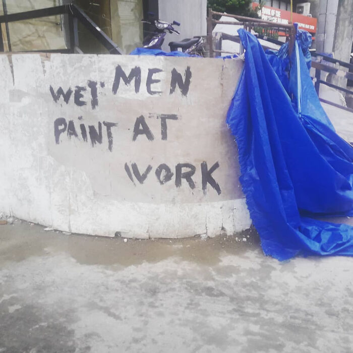 Wet Men Paint At Work