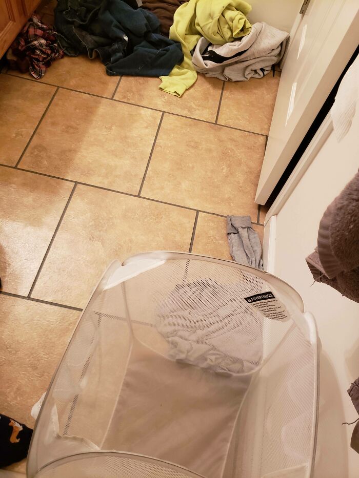 I Tried To Help My Boyfriend Keep His Bathroom Clean By Putting A Laundry Basket In There... So Close