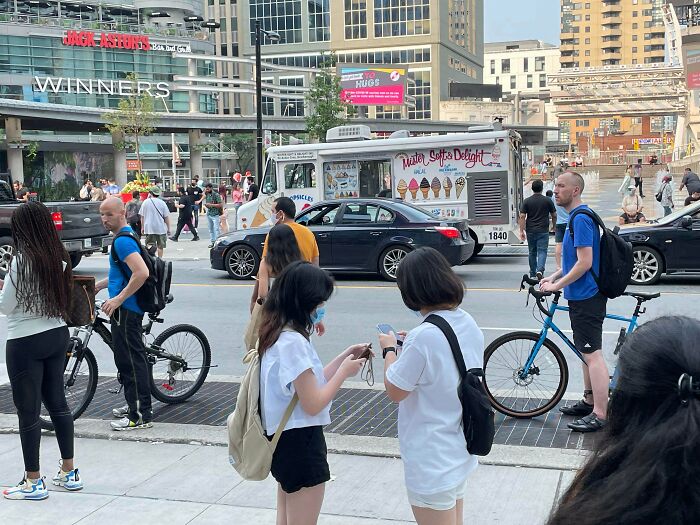 Doppelgängers In Toronto. Was Watching Street Performers Next To A Biker, And A Near Identical Biker Came And Stood In Front
