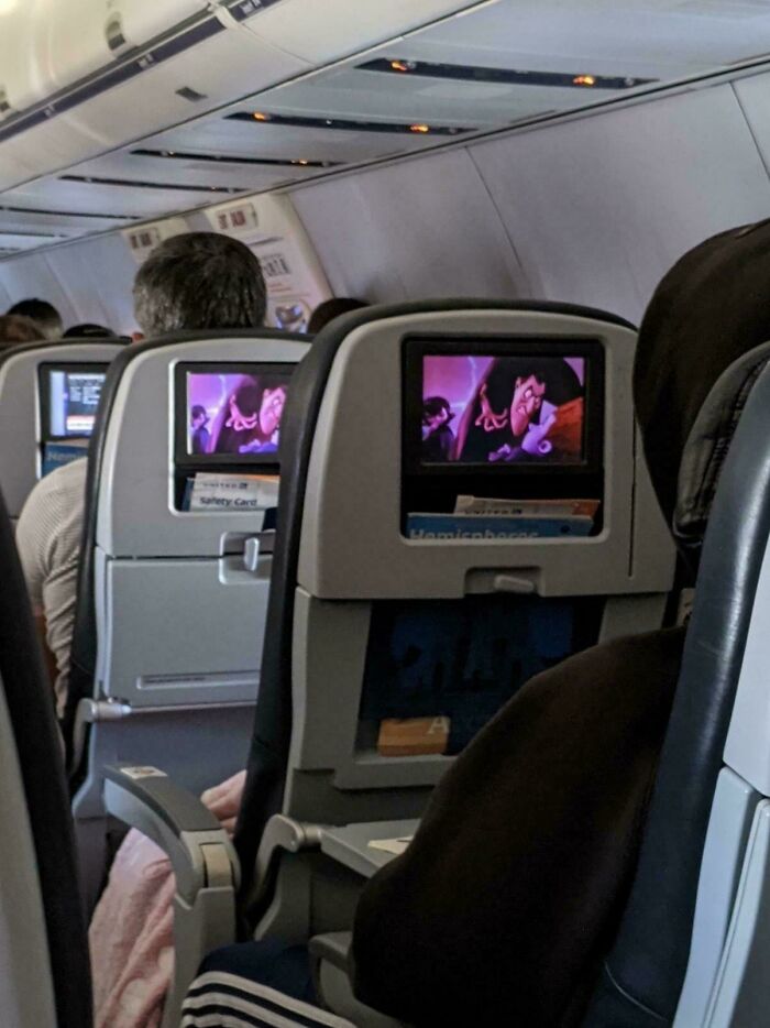 These Two Unrelated People On My Flight Started Watching The Same Movie At The Exact Same Time