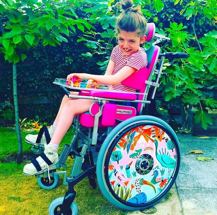 These Sisters Turn Wheelchairs Into Works Of Art With Colorful Wheel Covers