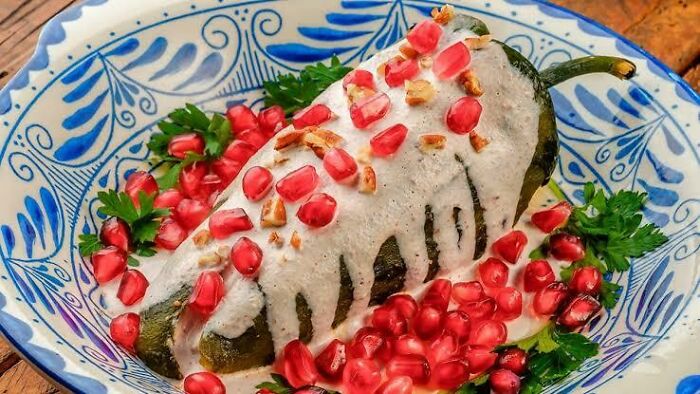 We Eat This Wonder Around September. It's Barely Spicy Pepper Stuffed With Minced Meat, Fruit And Nuts, Covered In Walnut Sauce And Pomegranate Seeds.
