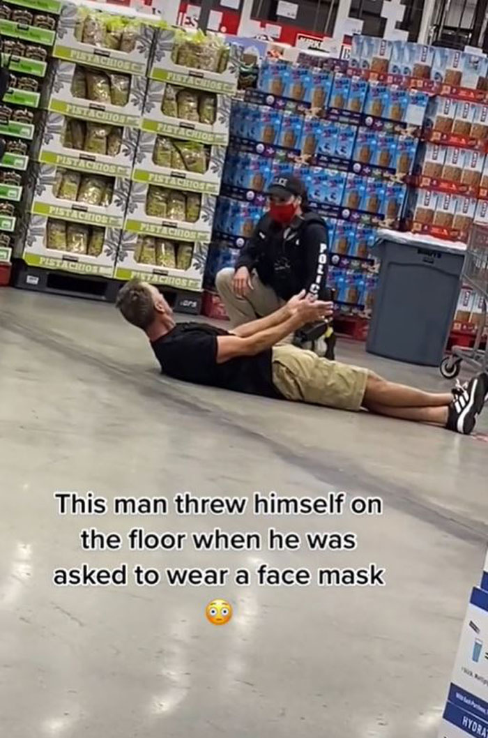 Anti-Masker Gets Roasted Online For Lying On Costco Floor For 8 Minutes To Protest Mask Requirements