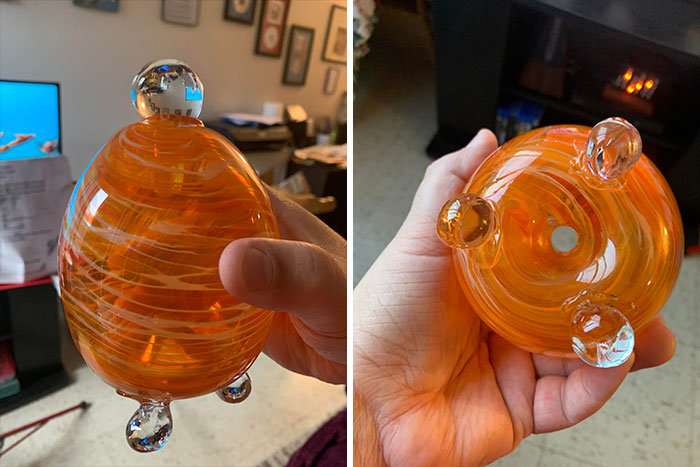 Glass Hollow Oval With Clear Glass Stopper And Three Glass Legs. It Has An Indentation On The Bottom With A Hole In The Middle Of It. What Is This?