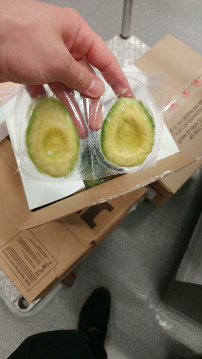 Peeled Avocados Wrapped In Plastic