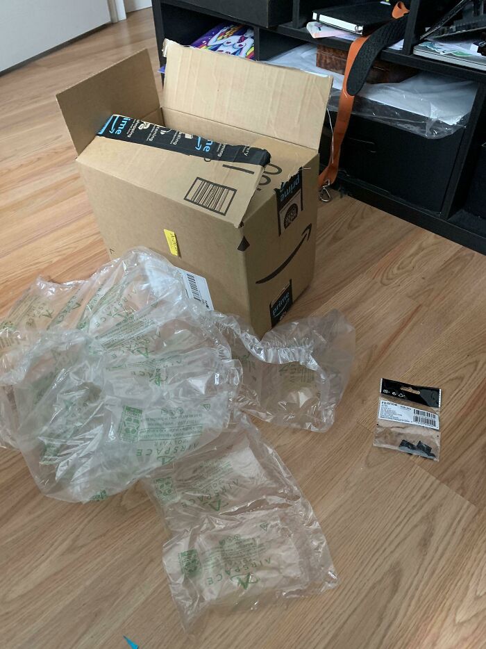 All This To Ship That Small Little Plastic Bag On The Right