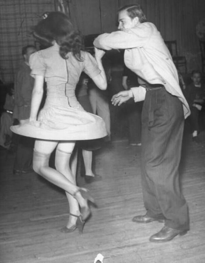 An Aircraft Worker Dancing With His Date At The Lockheed 'Swing Shift Dance' In 1942