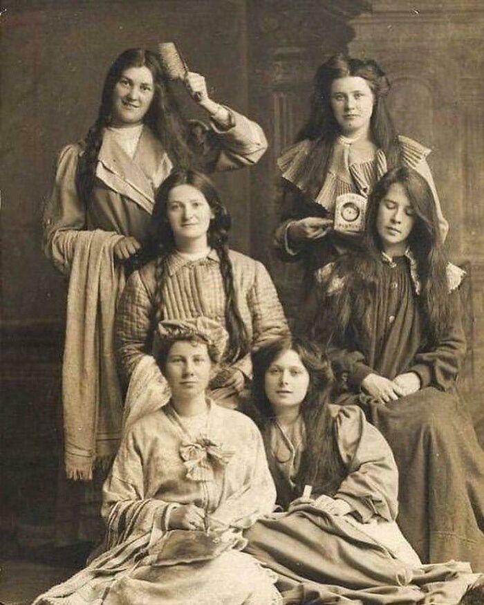 An Unknown Group Of Women, Possible Friends Or Fellow Students Pose For An Undated Photograph, With One Clearly Keen To Show Of Her Chunky Hairbrush. Possibly Late 1890s To 1900s