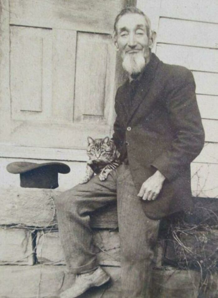 A Man With His Cat, Early 1900s