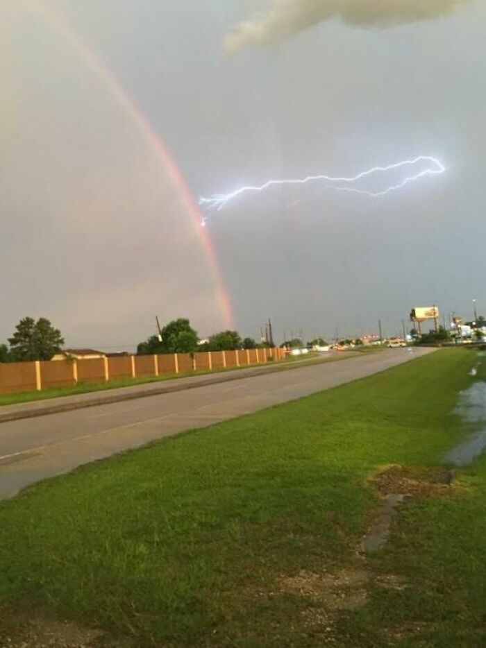 Lightning Striking A Rainbow, This Moment Caught On My Mom's Cell Phone