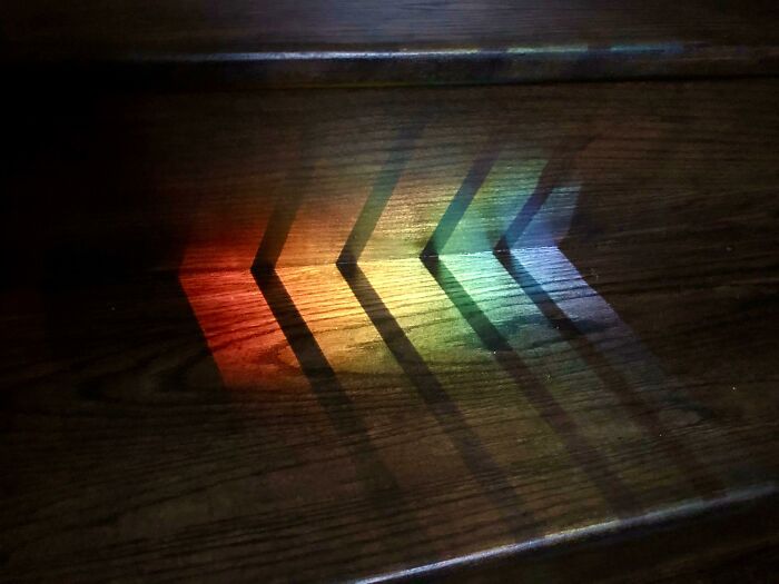 The Way The Railing’s Shadow Divided Up The Colours Of The Rainbow Reflection On My Stairs