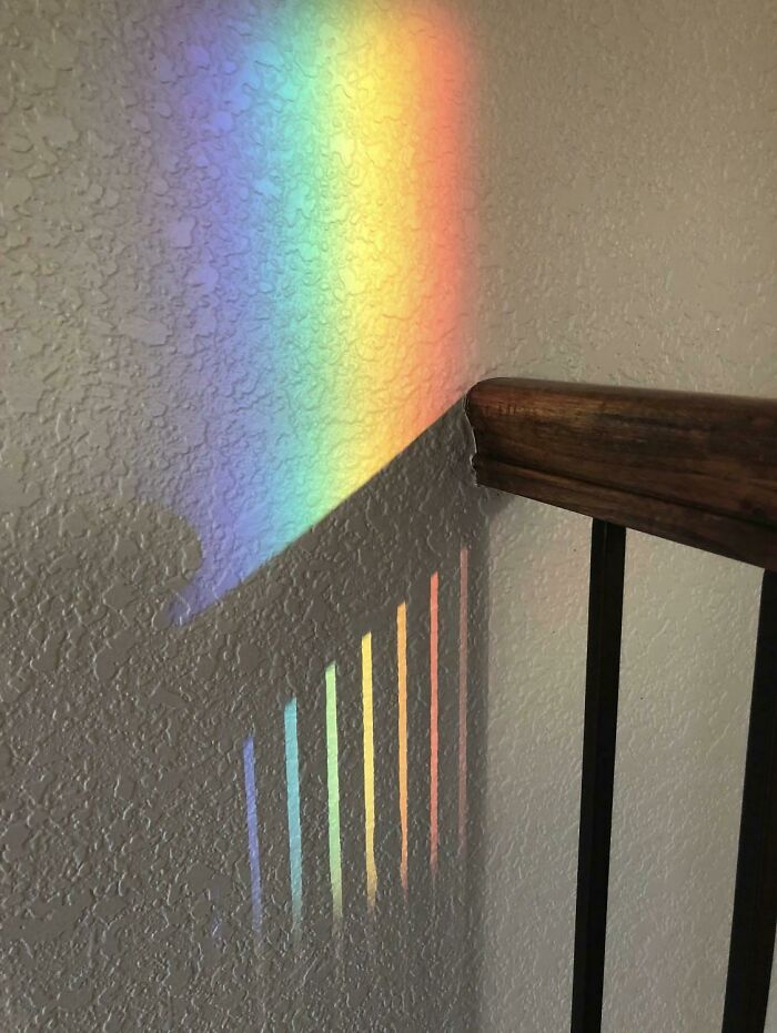 The Way This Rainbow Lines Up With The Railing Shadows