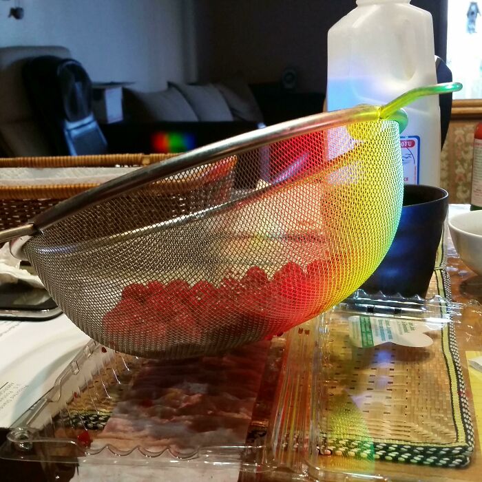 My Aquarium Formed A Prism, And Sunlight Hit This Sieve Of Raspberries