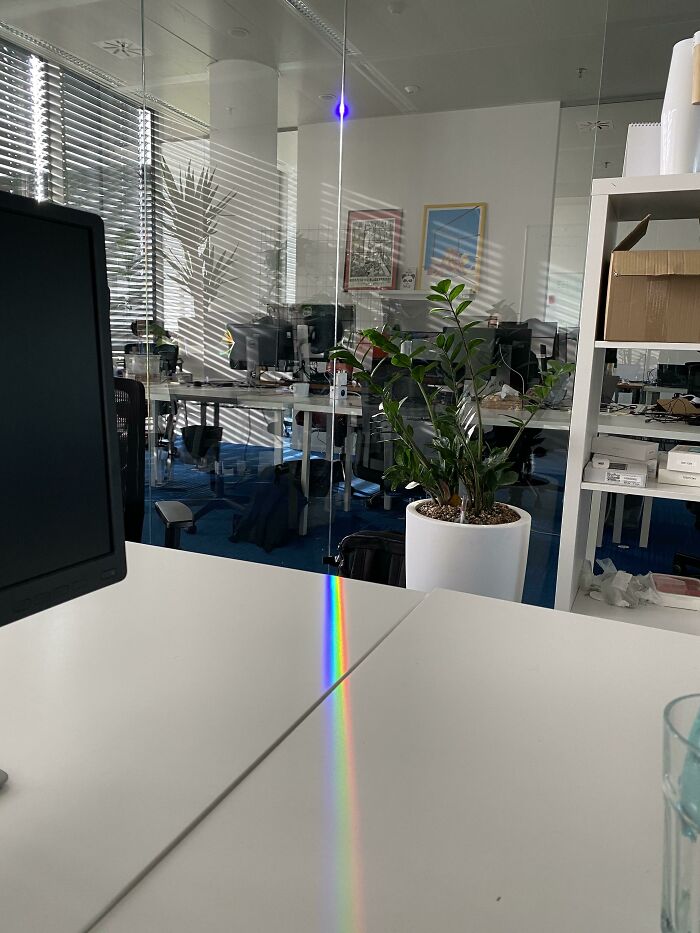 The Way Light Breaks Into A Rainbow On The Edge Of The Glass