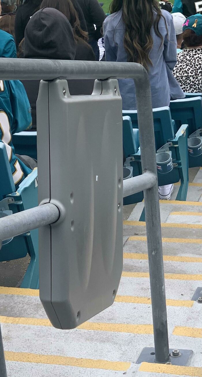 Plastic Box Attached To Some Of The Railings In An Nfl Stadium