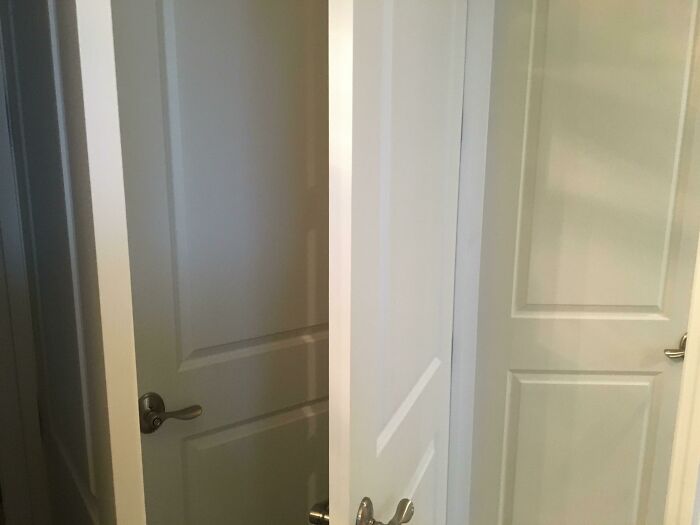 Four Doors, One Corner. Left To Right: Closet Door, Door Leading To Bathroom From Living Room, Door Leading To Bathroom From Bedroom, Bedroom Door