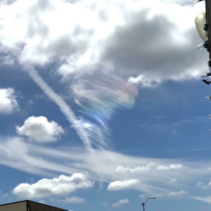 A Fire Rainbow Cloud In The Shape Of A Tornado