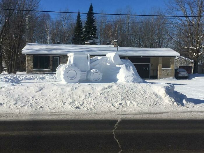 This Full Size Tractor Made Out Of Snow Not Far From Me