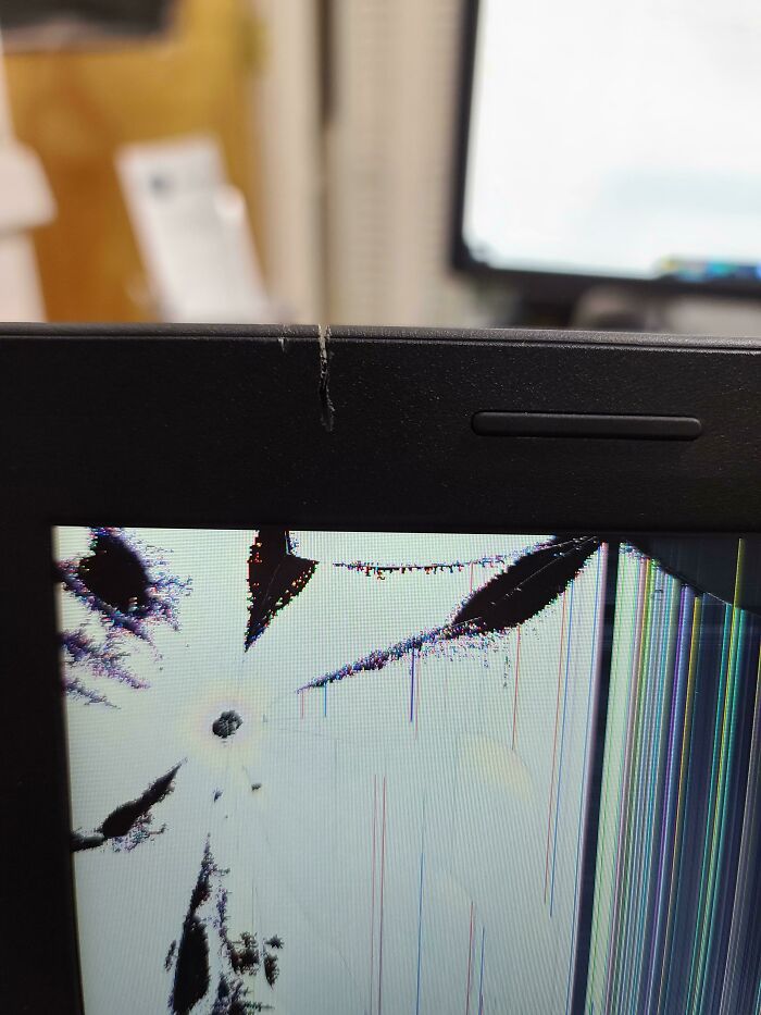 It's Hard To See But There Is A Cut That Goes Through The Bezel At The Top. In Addition To Destroying The Screen, This Student Cut Through The Chromebook! They Ran Their Face Mask's Elastic String Back And Forth Creating Friction To Cut It.