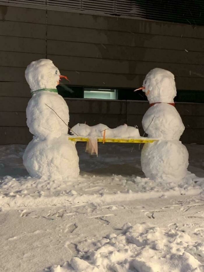 After The Recent Snow Storm Here, Some Crew Decided To Make Snowmen Out Side Of The Ambulance Bay
