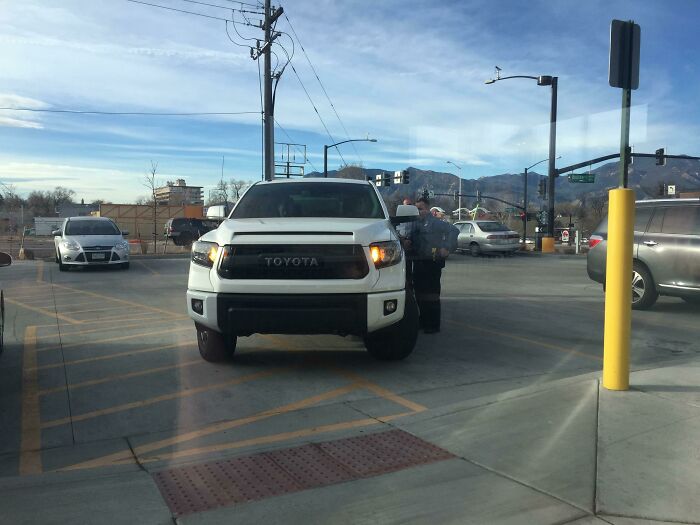 I’m Sitting In Starbucks And A Bunch Of Cops Are Here Too. This Guy Parks In A Handicap Spot And Has His Kid Run In To Pickup Their Drinks. As The Guy Is Backing Out 2 Cops Run Out And Give Him A Ticket