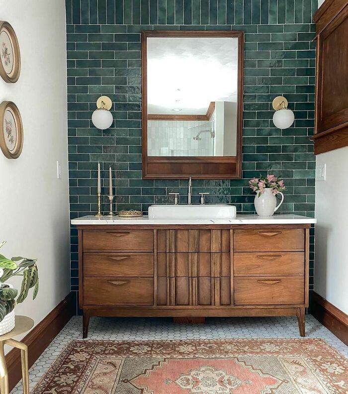 Green Tiled Vanity Wall In The Bathroom Of A Renovated 1910 Michigan Home