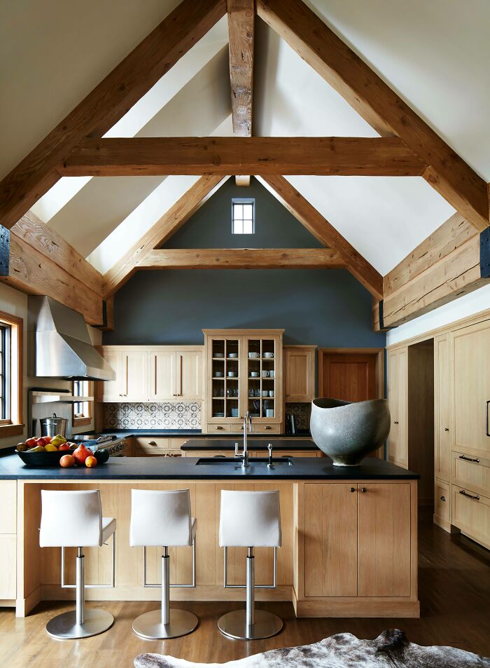 Kitchen With Exposed White Oak Beams In A Ski Chalet Built Directly Into The Side Of A Mountain In Aspen, Colorado