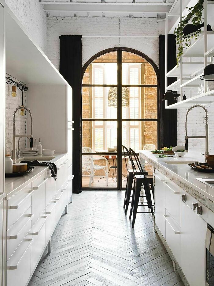 Galley Kitchen In A Remodeled Apartment With Exposed Brick Walls, Barcelona, Spain 