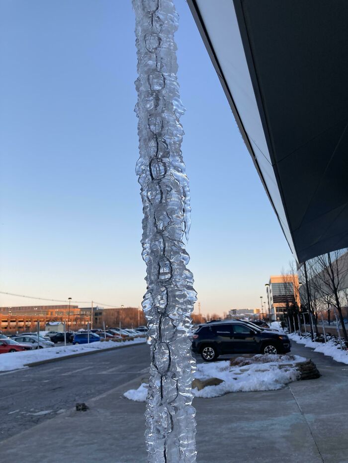 Draining Water Froze Around A Chain Creating A Cool Icicle