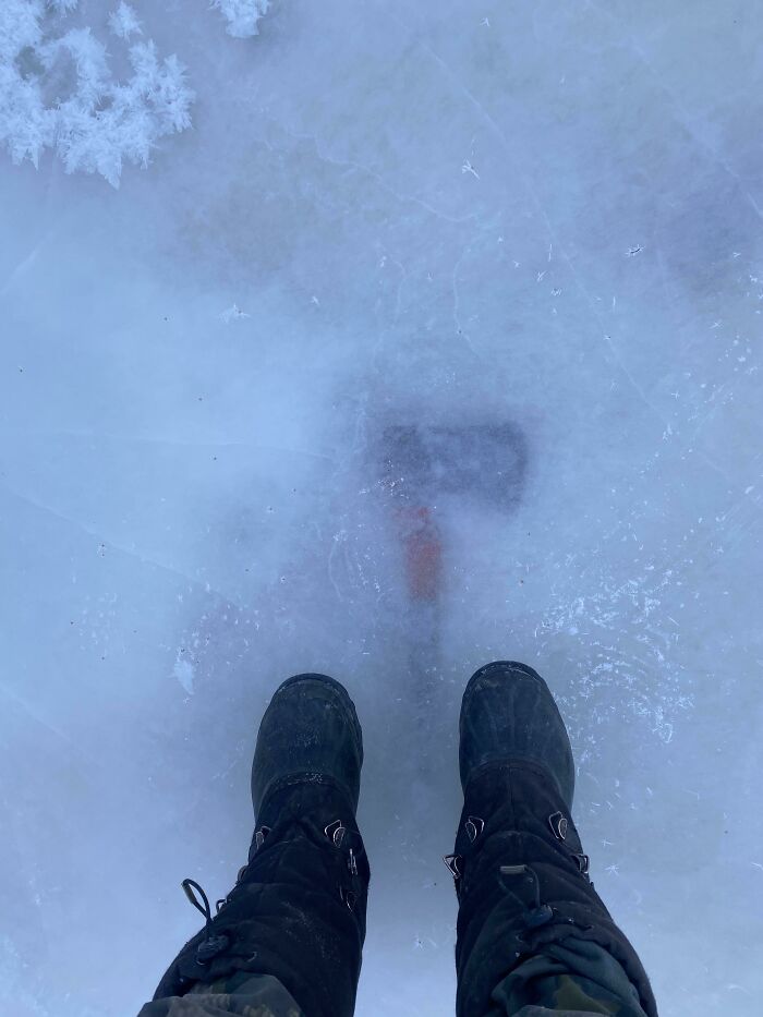 This Axe Left On Top Of A Frozen Creek, Now An Inch Under Ice