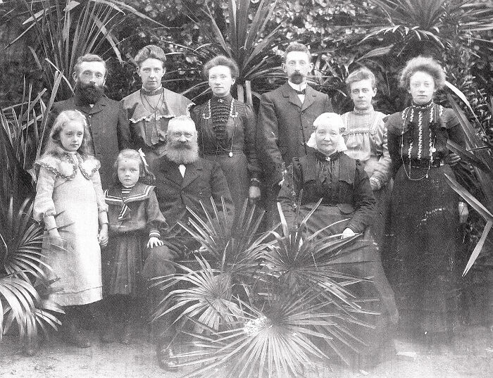 This Is My Grandmother (Far Right) And Her Family In Friesland In The Netherlands. My Great Grandmother (Seated On The Right) Is Wearing A Traditional Bonnet. When You Were Considered A Grown Woman Your Hair Was Clipped Short. Over Your Hair They Put A Black Cap. Over That Was The Oorijzer, A Silver Or Gold Helmet That Has A Large V Shape Cut Out In The Front. Over That Is A Lace Cap With A Longer Section At The Nape Of The Neck. There Are Clips Attached To The Oorijzer That Help Hold The Lace In Place. It Looks Like My Great Grandmother Has Little Elfin Ears. This Picture Is From Around1890. My Grandmother Lived To Be 98.