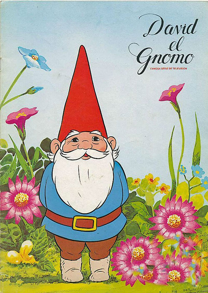 Cartoon gnome in a colorful garden, showcasing the charm of '80s cartoons with bright flowers and greenery.
