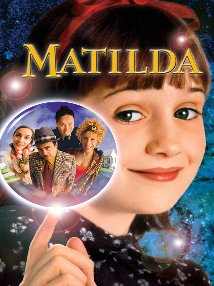 '90s kids movie poster for "Matilda" featuring a smiling girl pointing at a glowing orb with characters inside.
