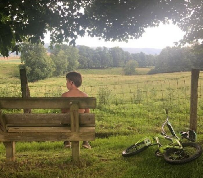 My 7 Year Old Boy, Finding Shelter From The Rain, While Out Riding Bikes