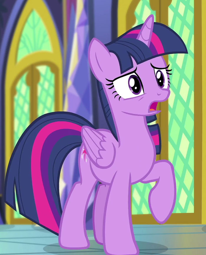 Cute animated character, a purple unicorn with big eyes, standing indoors with an expressive face.
