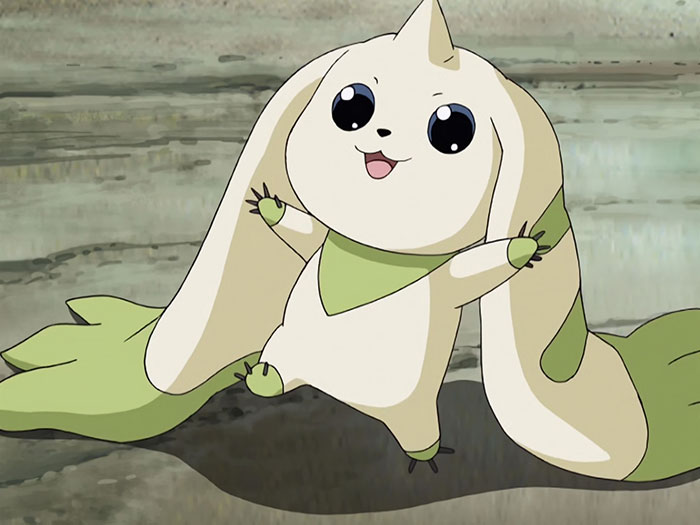 Cute animated character with long ears and a joyful expression, wearing a green scarf-like accessory.