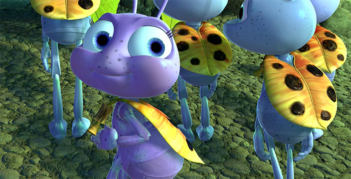 Cute animated characters, featuring a smiling purple insect with big eyes and yellow ladybug-like wings, in a forest scene.