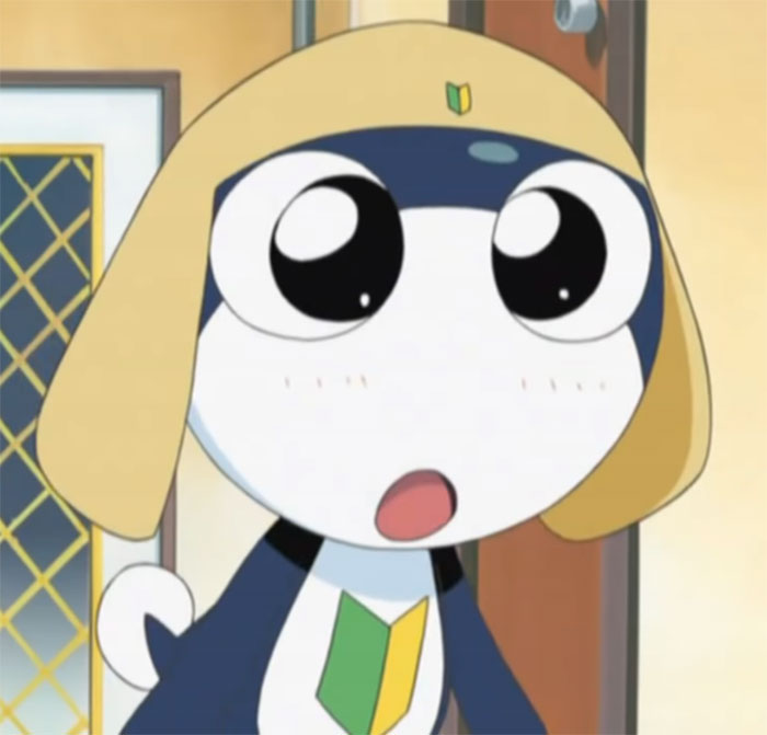 Cute animated character with big eyes and floppy hat, looking surprised.