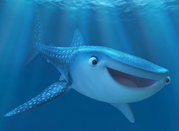 Cute animated character of a smiling blue whale shark underwater.