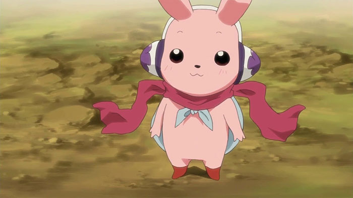 Cute animated character with pink ears, big eyes, a red scarf, and boots standing on a grassy ground.
