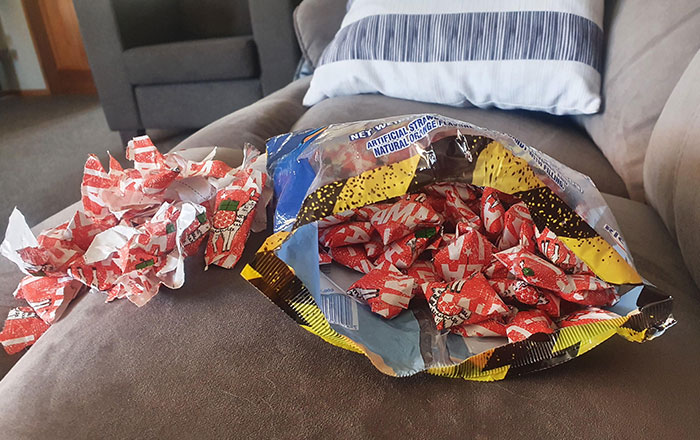Sister Got Me A 1lbs Bag Of Sour Lollies For Xmas. Only She Wrapped Each Lolly Individually. 1 Hour Of Unwrapping