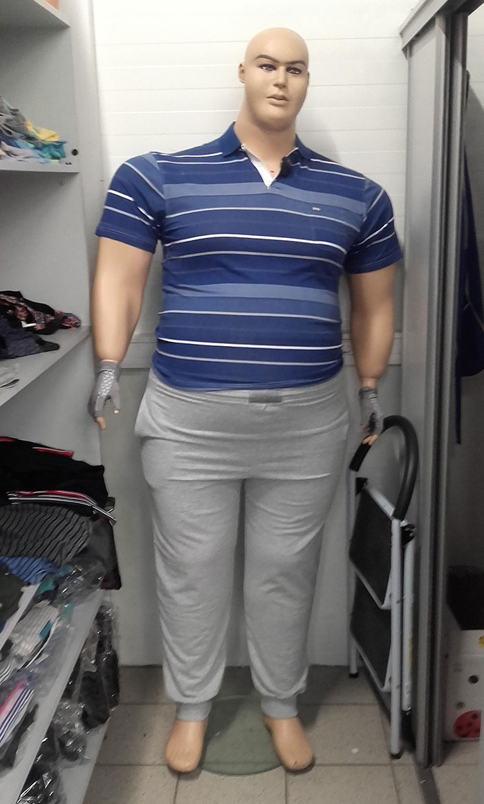 This Large Mannequin With Small Clothes