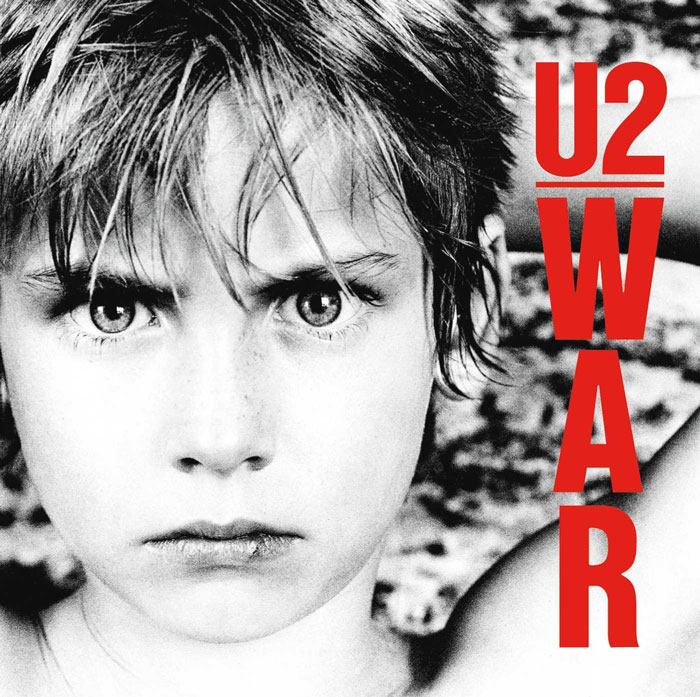 A powerful black-and-white portrait of a child on one of the greatest album covers by U2.
