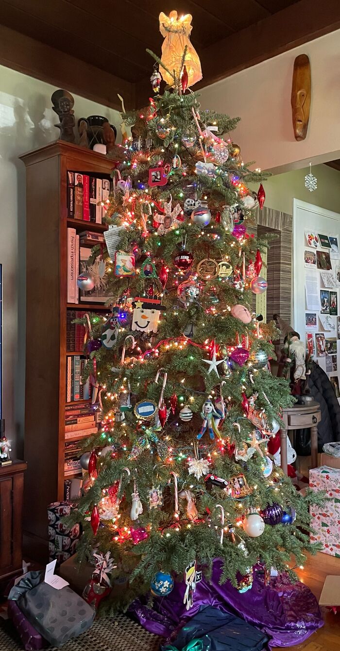 Filled Pics Of The Kids & And Ornaments From Vacations.