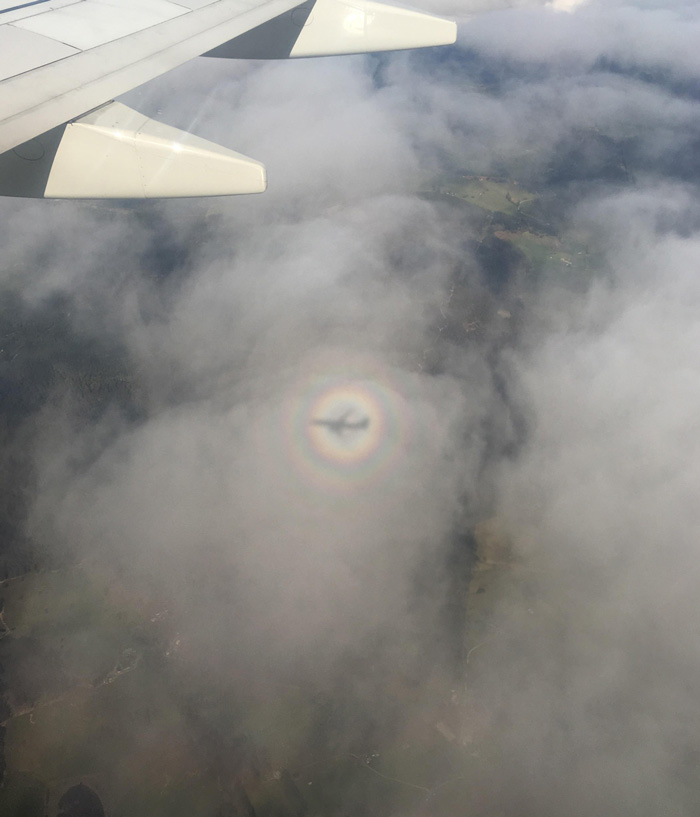 This Rainbow Around The Airplane’s Shadow