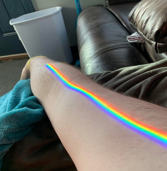 A Vibrant And Clear Spectrum Of Colors Refracting Through My Apparently Prismatic Window Onto My Arm