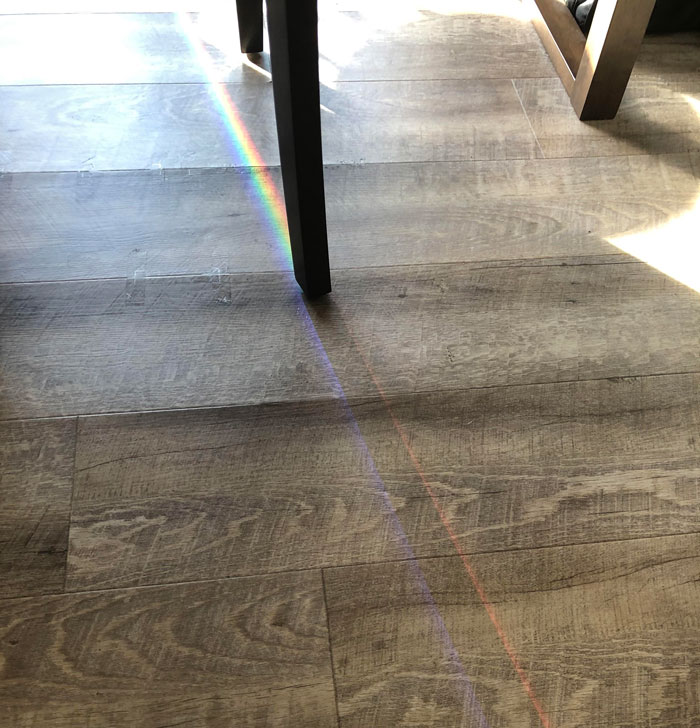 The Sun On My Window Made A Rainbow That’s Split In Half By My Chair Leg