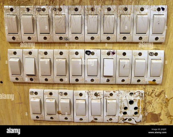 large-bank-of-electric-light-switches-JK9JFE-61bff12954211.jpg