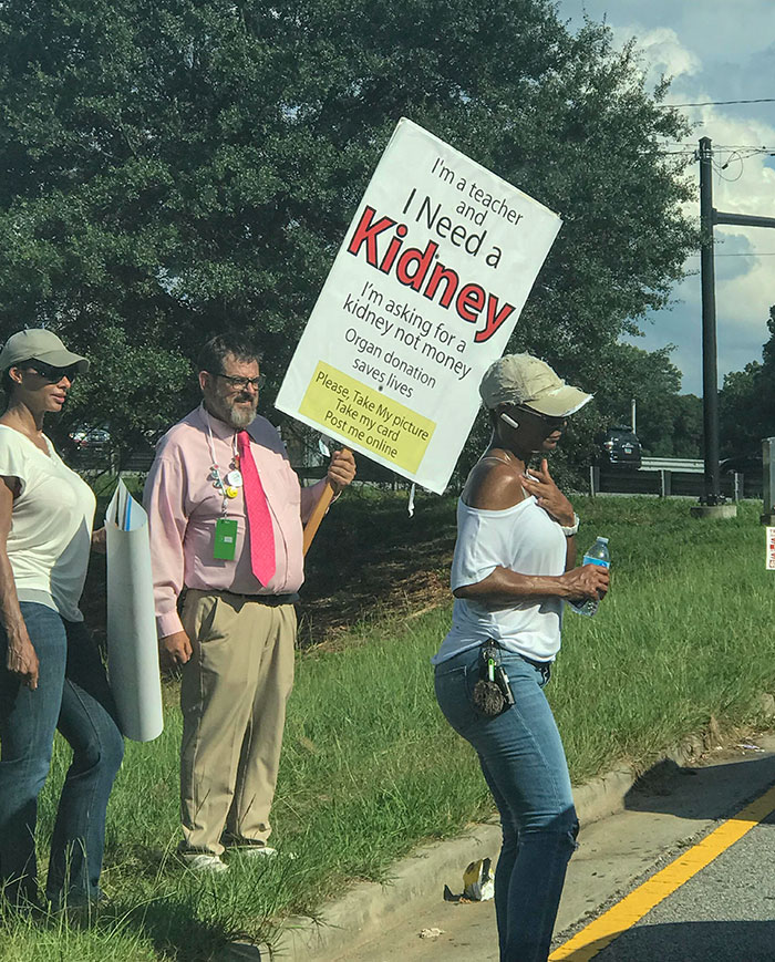 Local Teacher And His Colleagues Stand On A Street Corner In Atlanta In Hopes Of Finding Him An Organ Donor. I’m Sorry I Didn’t Get His Card